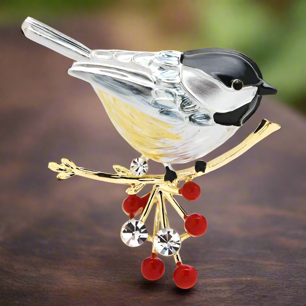 Bird-themed accessories like our robin pin worn at a garden party