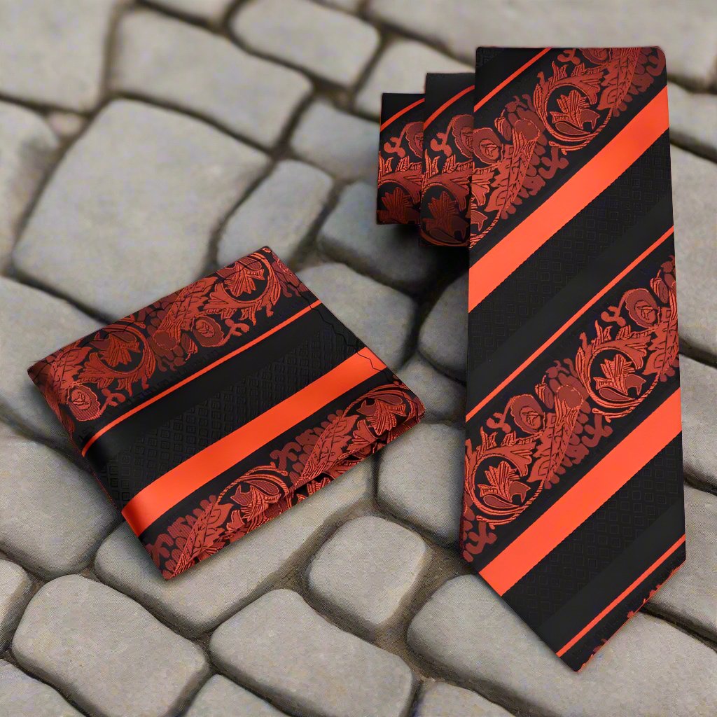 Elegant floral silk necktie displayed with matching pocket square, showcasing vibrant colors.