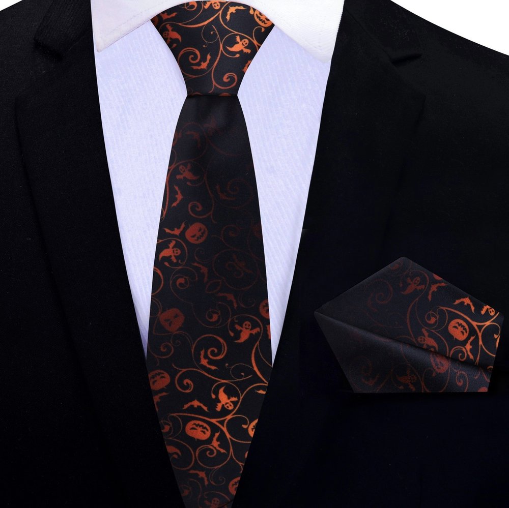 Spooky Charm Halloween Silk Necktie displayed against a black background, highlighting its playful ghost and pumpkin designs.
