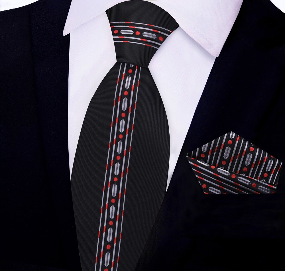 Close-up of the silk tie showing black, red, and grey linked stripe pattern—ideal for formal wear.