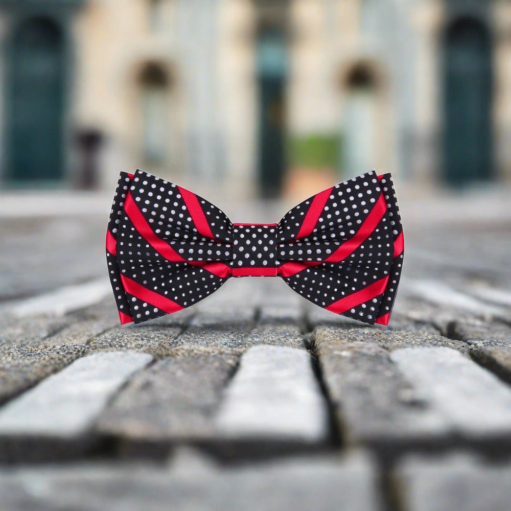 Elegant bow tie paired with a charcoal grey suit, perfect for formal events.