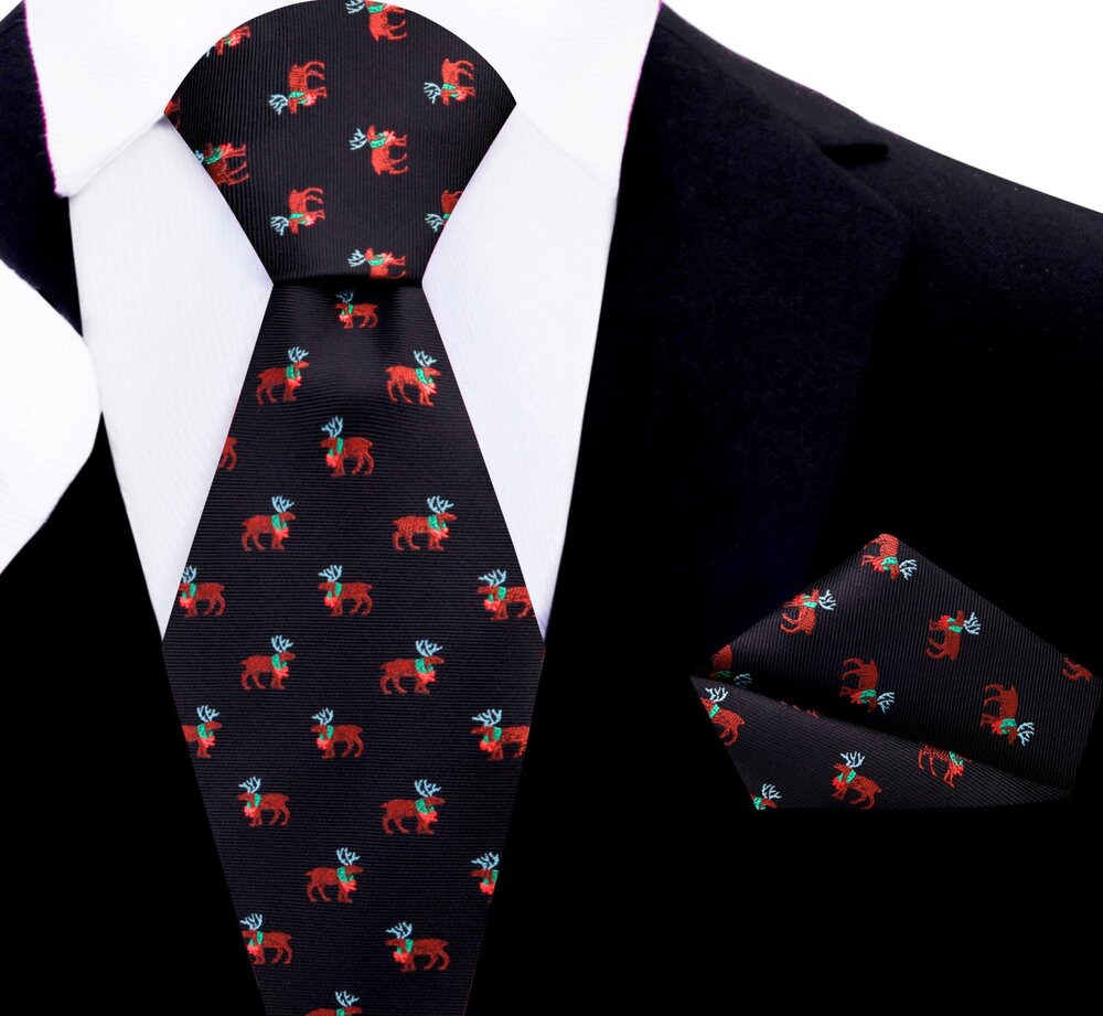 Man wearing Christmas necktie with reindeer pattern at holiday office party