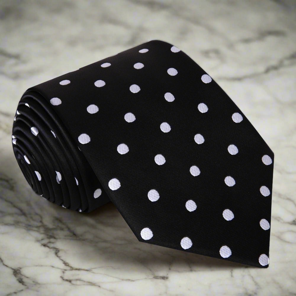 Close-up of a classic polka dot silk necktie with a sleek design