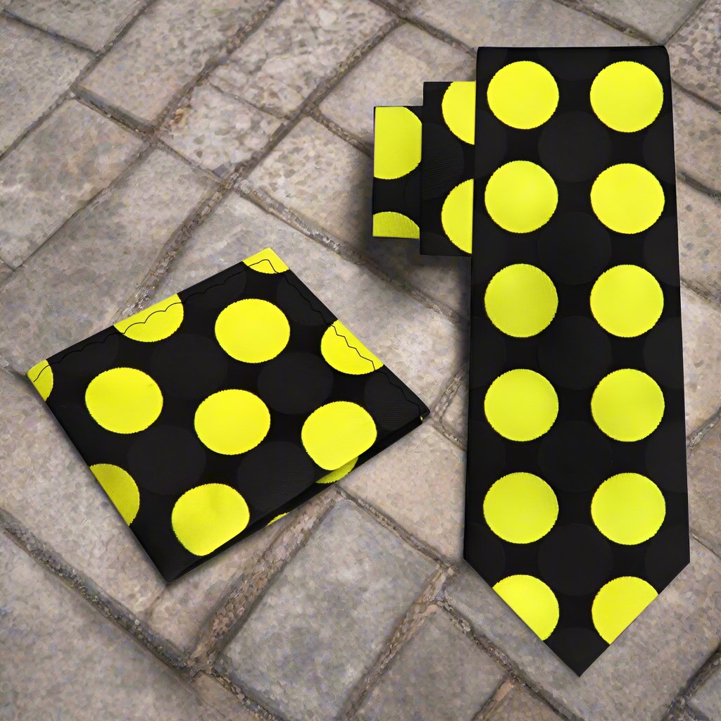 Large polka dot silk necktie in vibrant colors, showcasing the bold pattern against a white shirt.
