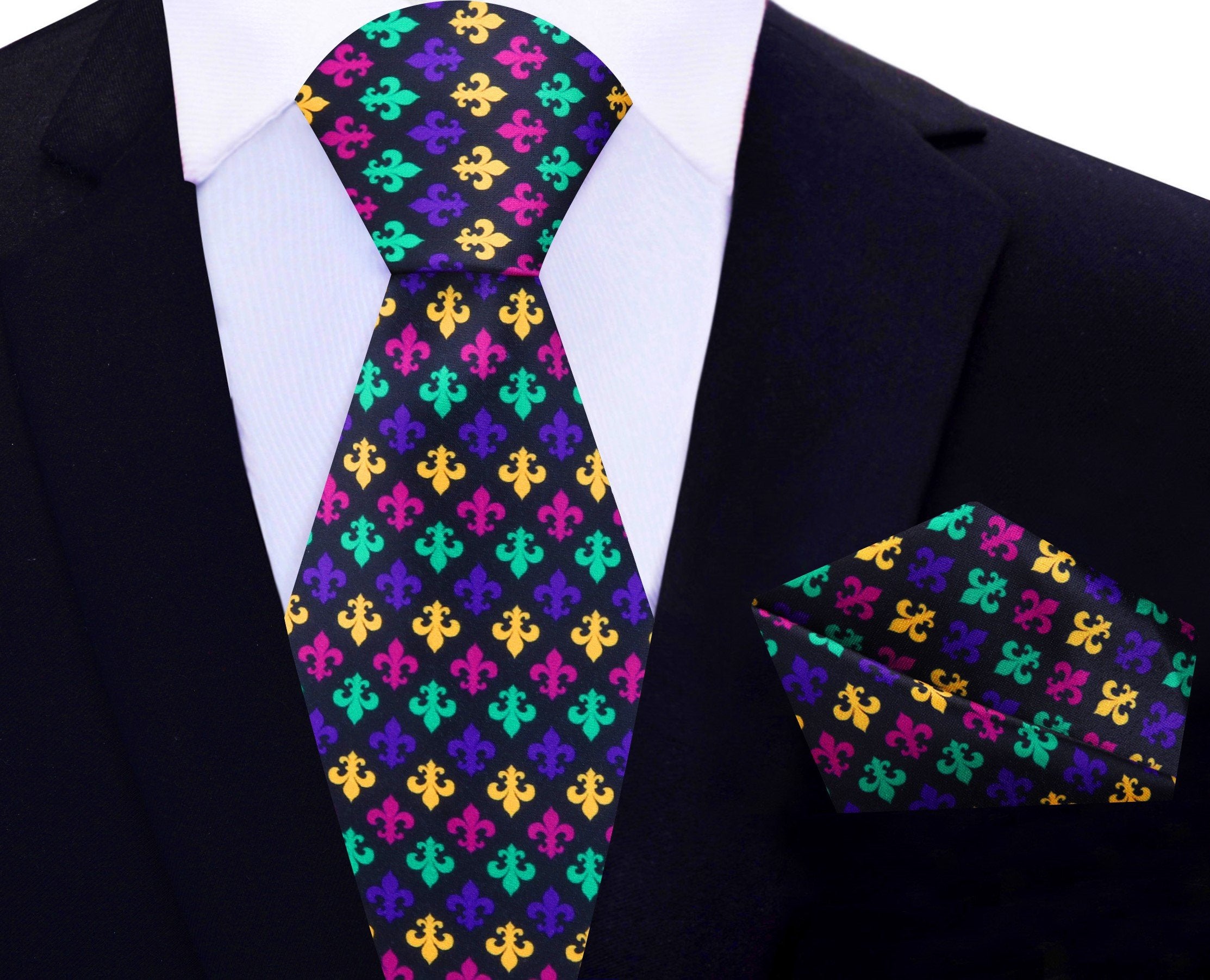 Model showcasing the Mardi Gras silk necktie paired with a dark suit, emphasizing the colorful design.