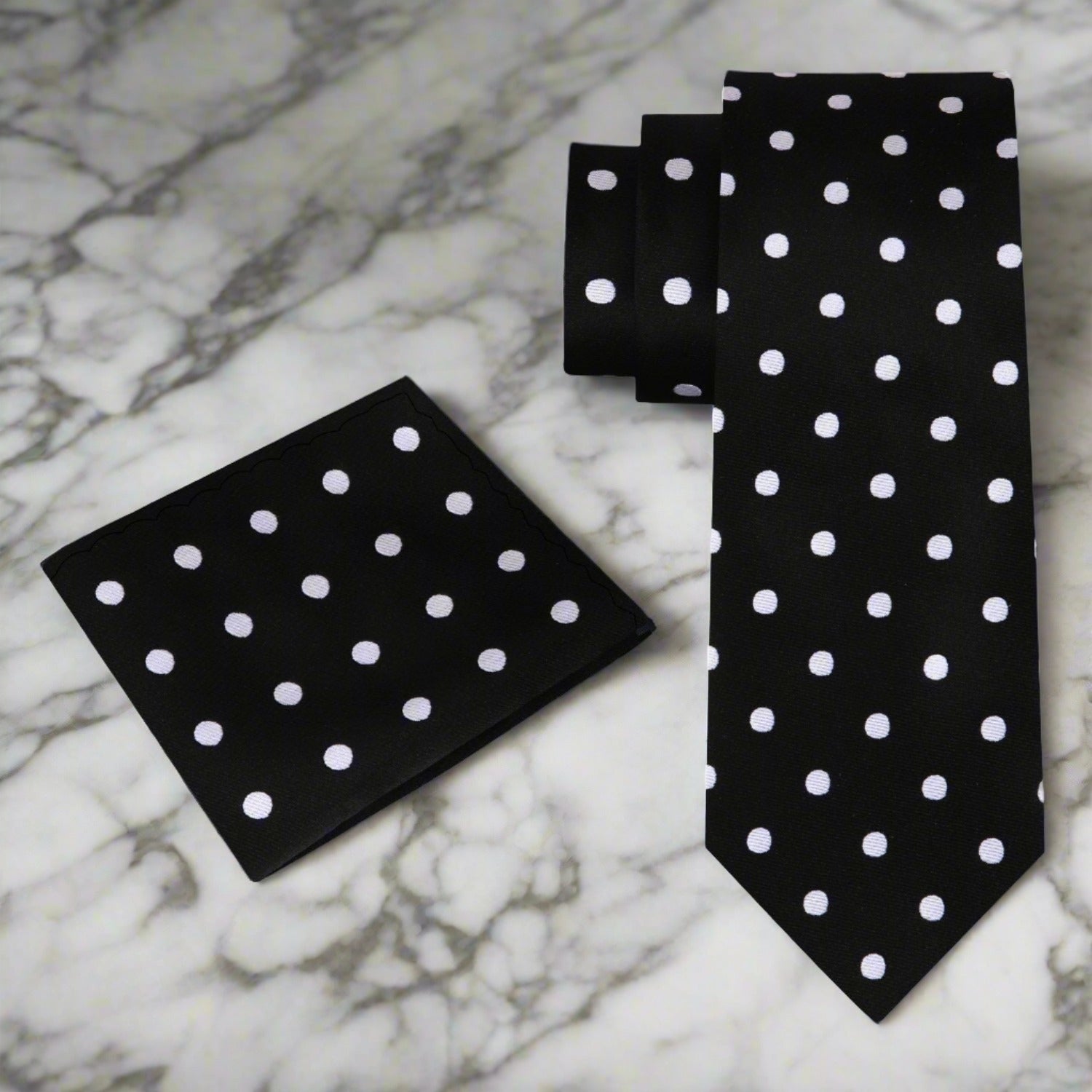 Close-up of a classic polka dot silk necktie with a sleek design