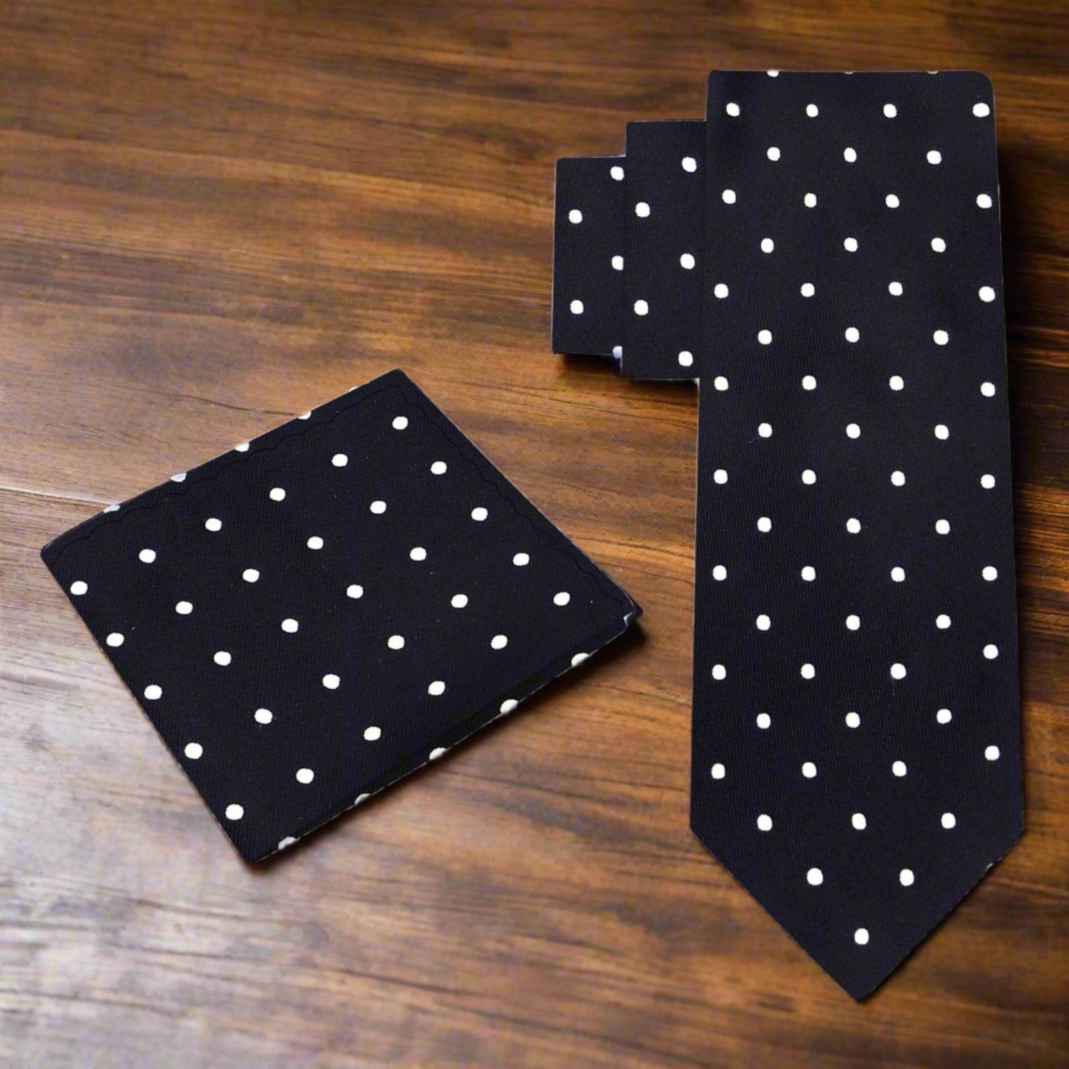 Close-up of a classic polka dot silk necktie with a sleek design