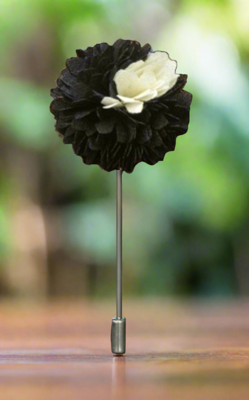 Elegant flower lapel pin on a tailored suit jacket, highlighting its stylish appeal.