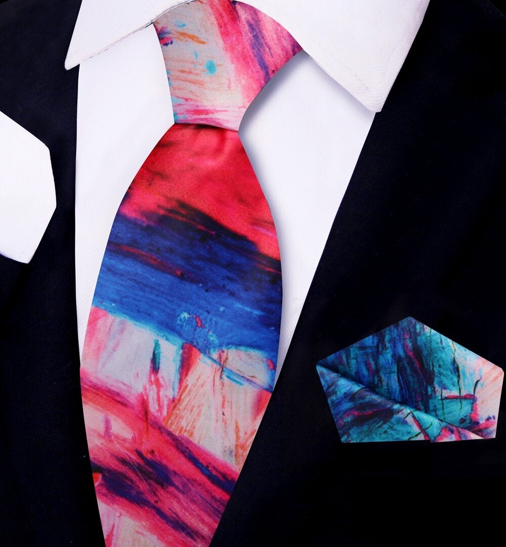Stylish gentleman wearing a watercolor tie at a formal event, demonstrating versatile fashion.