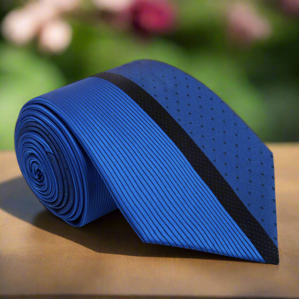 Close-up of silk tie fabric showing blue stripe pattern on men's necktie