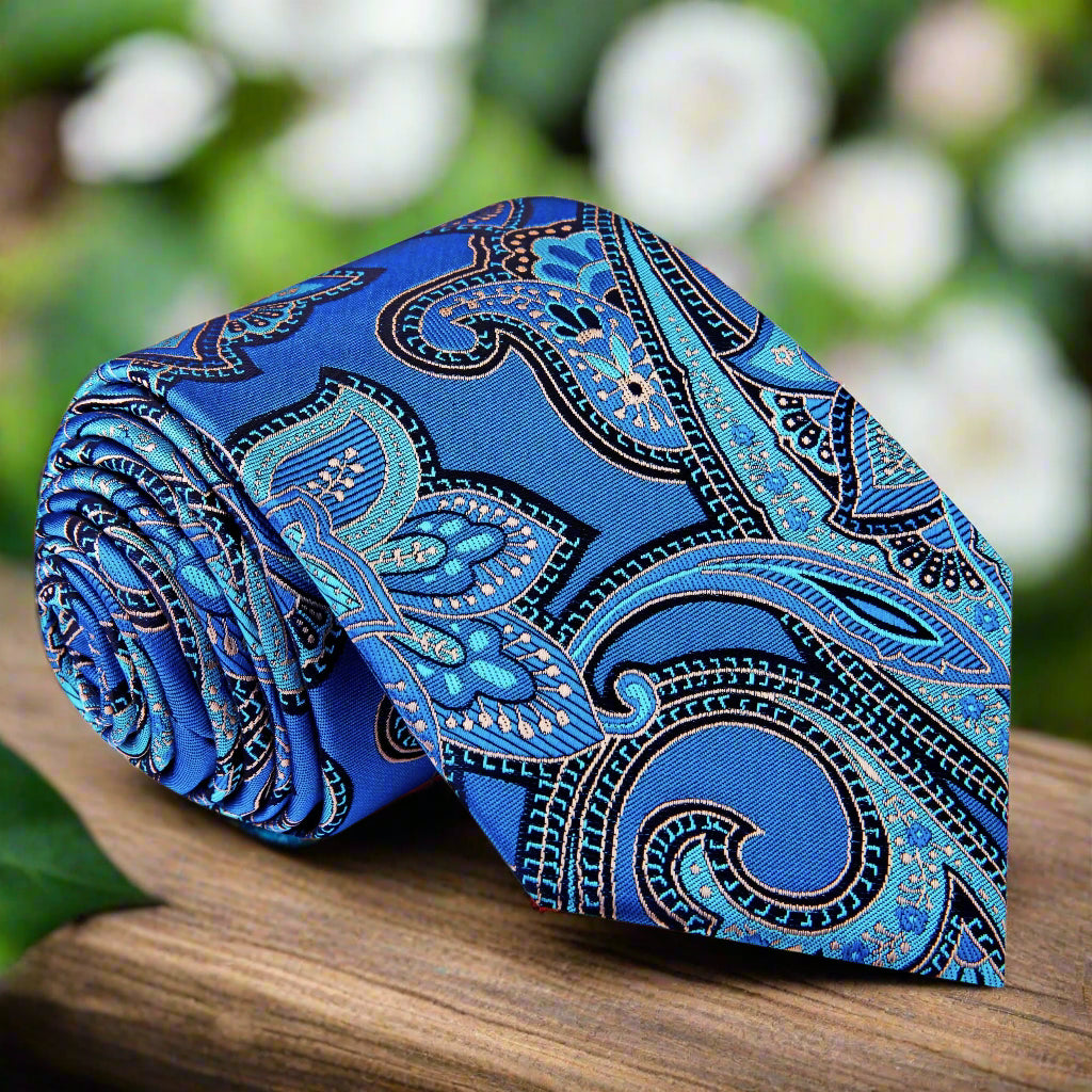 Elegant navy blue paisley silk tie with intricate floral pattern for weddings
