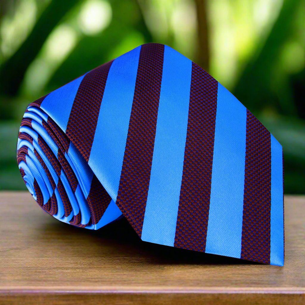 Close-up of the silk tie showing blue and red stripe pattern, ideal for office wear