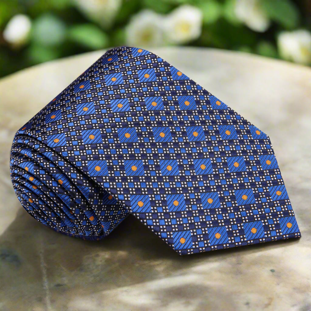 Front view of a luxury geometric silk necktie in blue tones, ideal for business meetings