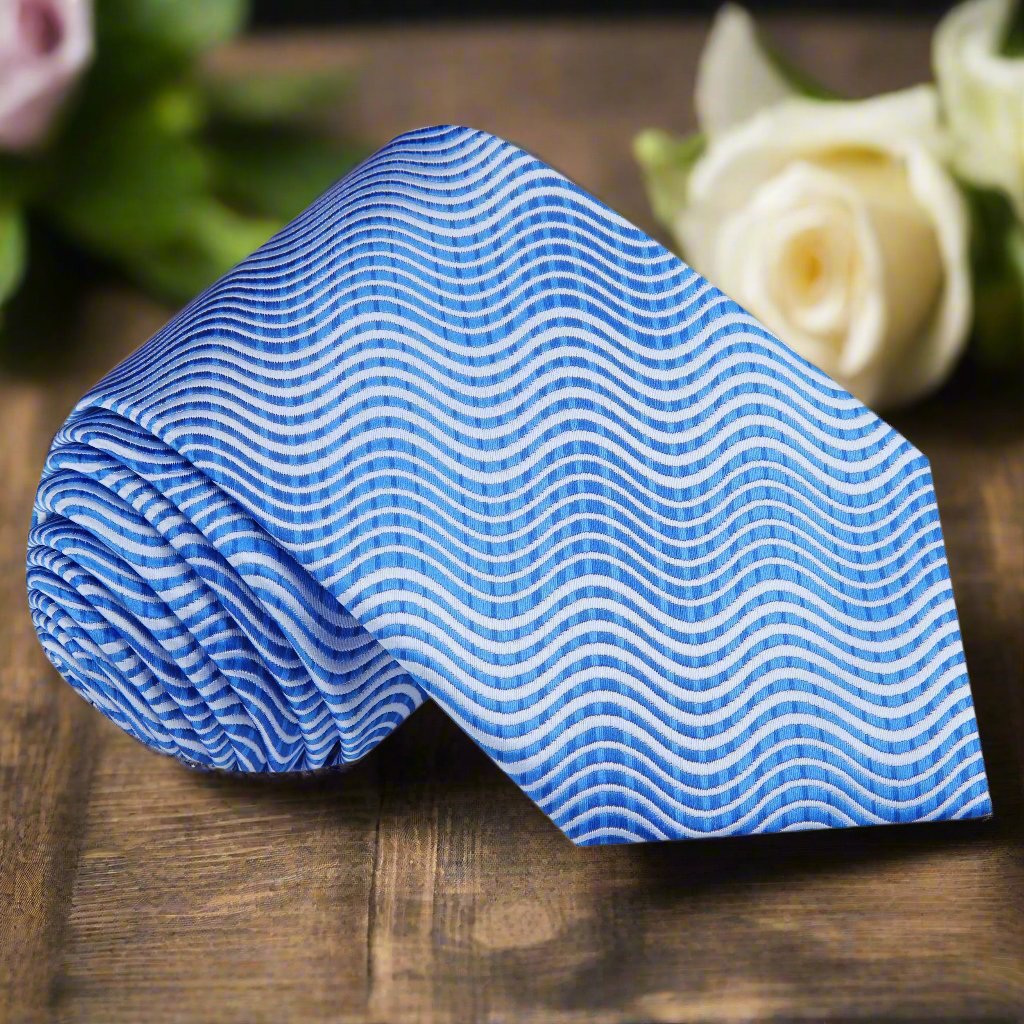 Elegant blue abstract silk necktie with flowing wavy lines, ideal for formal events