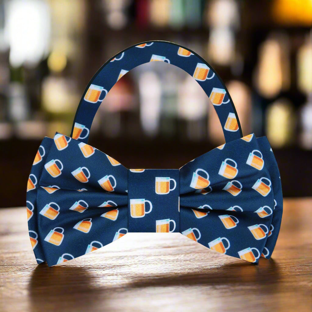Close-up of a dark blue beer mug patterned bow tie, perfect for Oktoberfest