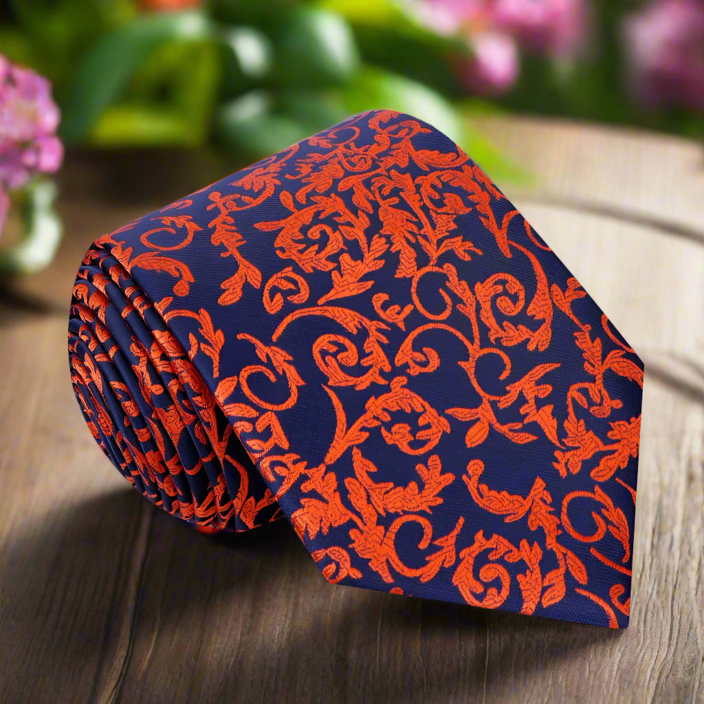 Dark blue silk necktie with sage vine pattern, ideal for business events.