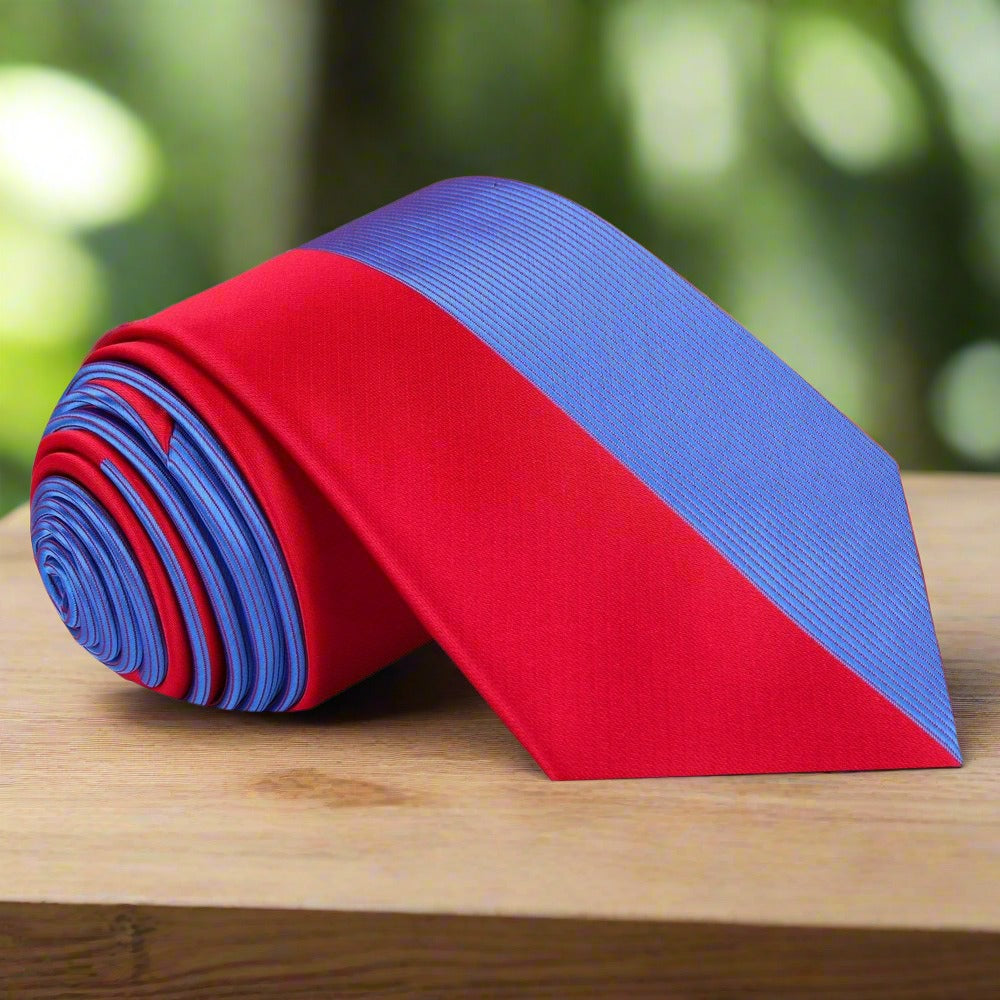 Close-up of the two-toned silk necktie showcasing the center line pattern.