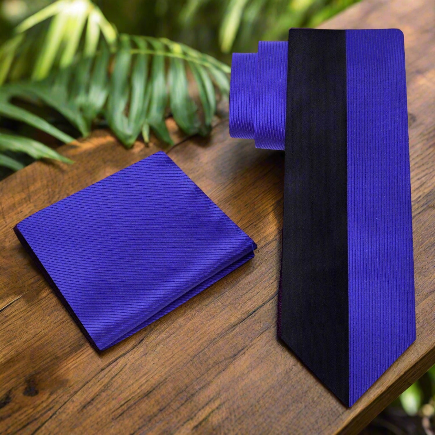 The necktie displayed against a charcoal grey suit, ideal for evening events.