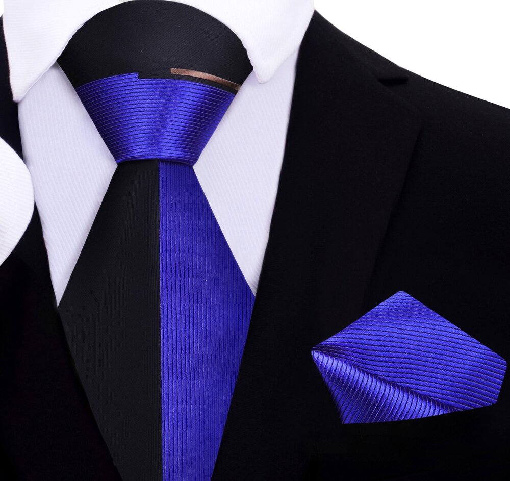 The two-toned silk necktie paired with a crisp white shirt, perfect for business.