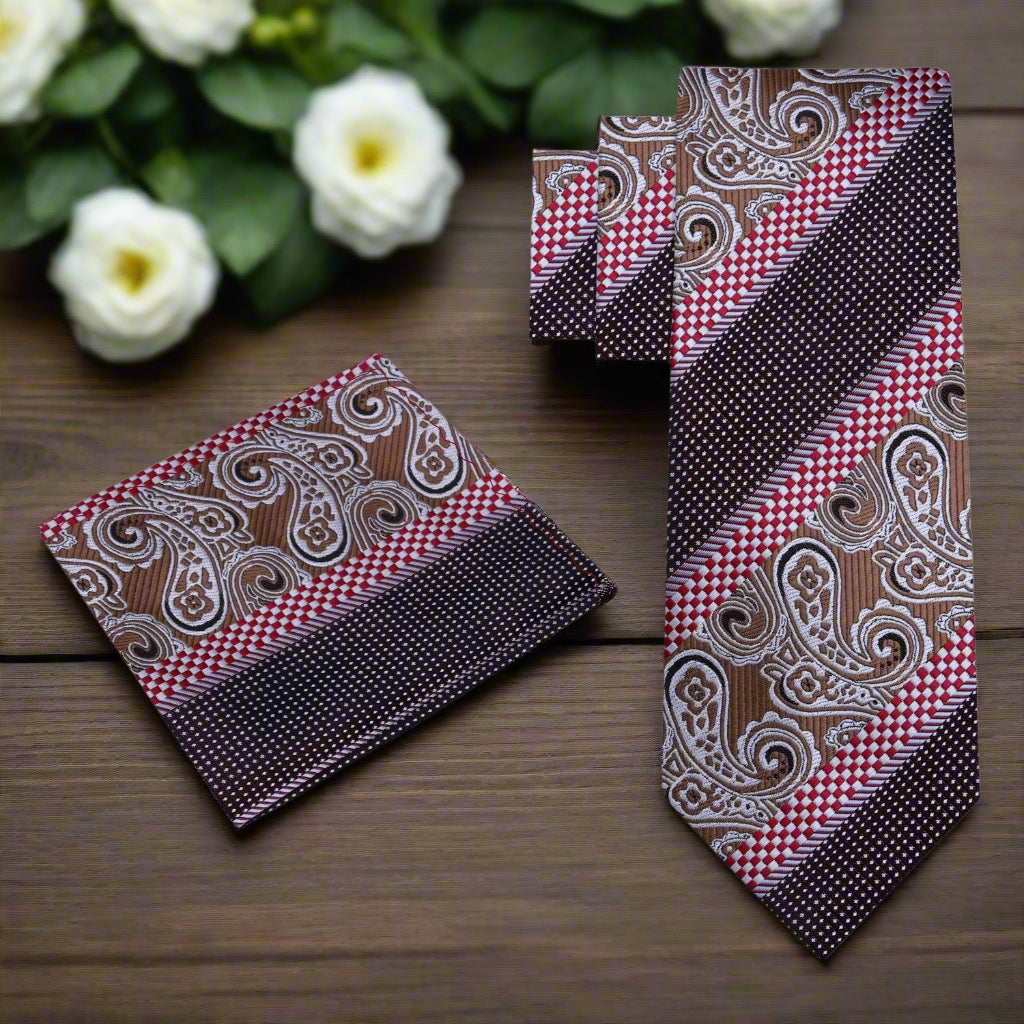 Close-up of the elegant paisley necktie showcasing intricate patterns in green and brown.