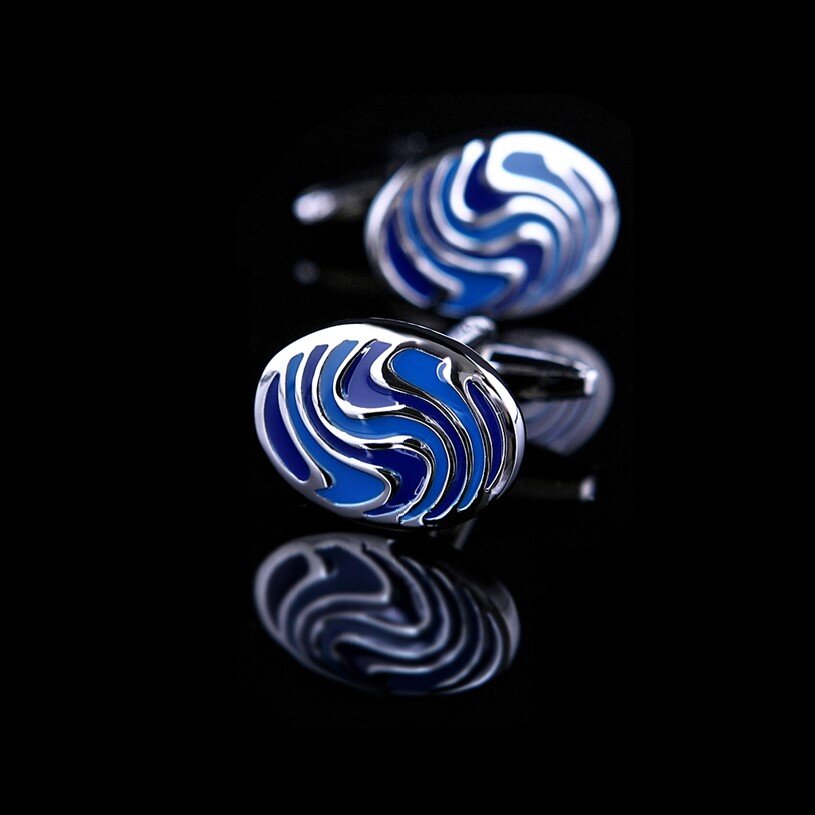 Stylish cufflinks for business conferences featuring blue swirl patterns