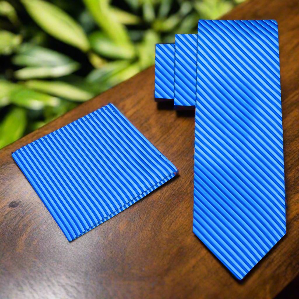 Dark blue pinstripe necktie styled with a charcoal suit for a formal look.