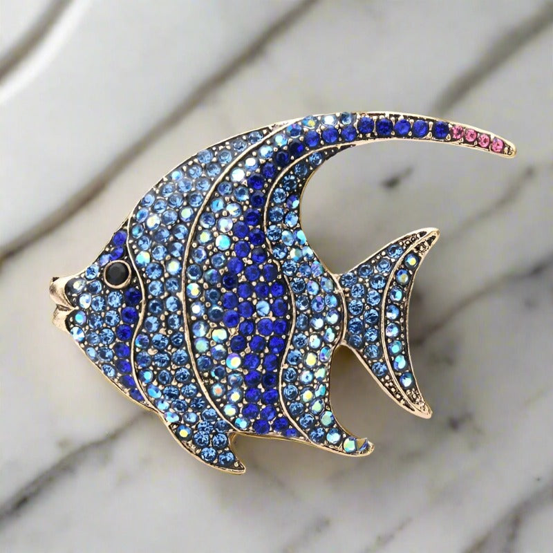 Close-up of a gemstone lion lapel pin with detailed craftsmanship