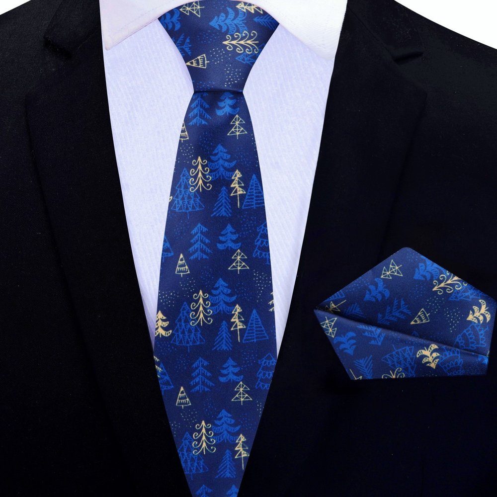 Blue and gold Christmas Forest necktie with pocket square on a formal shirt