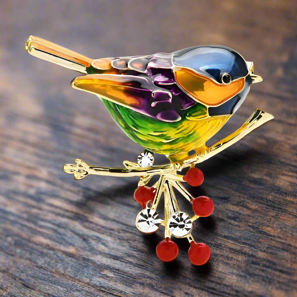 Close-up of a colorful robin lapel pin showcasing vibrant details and chrome finish