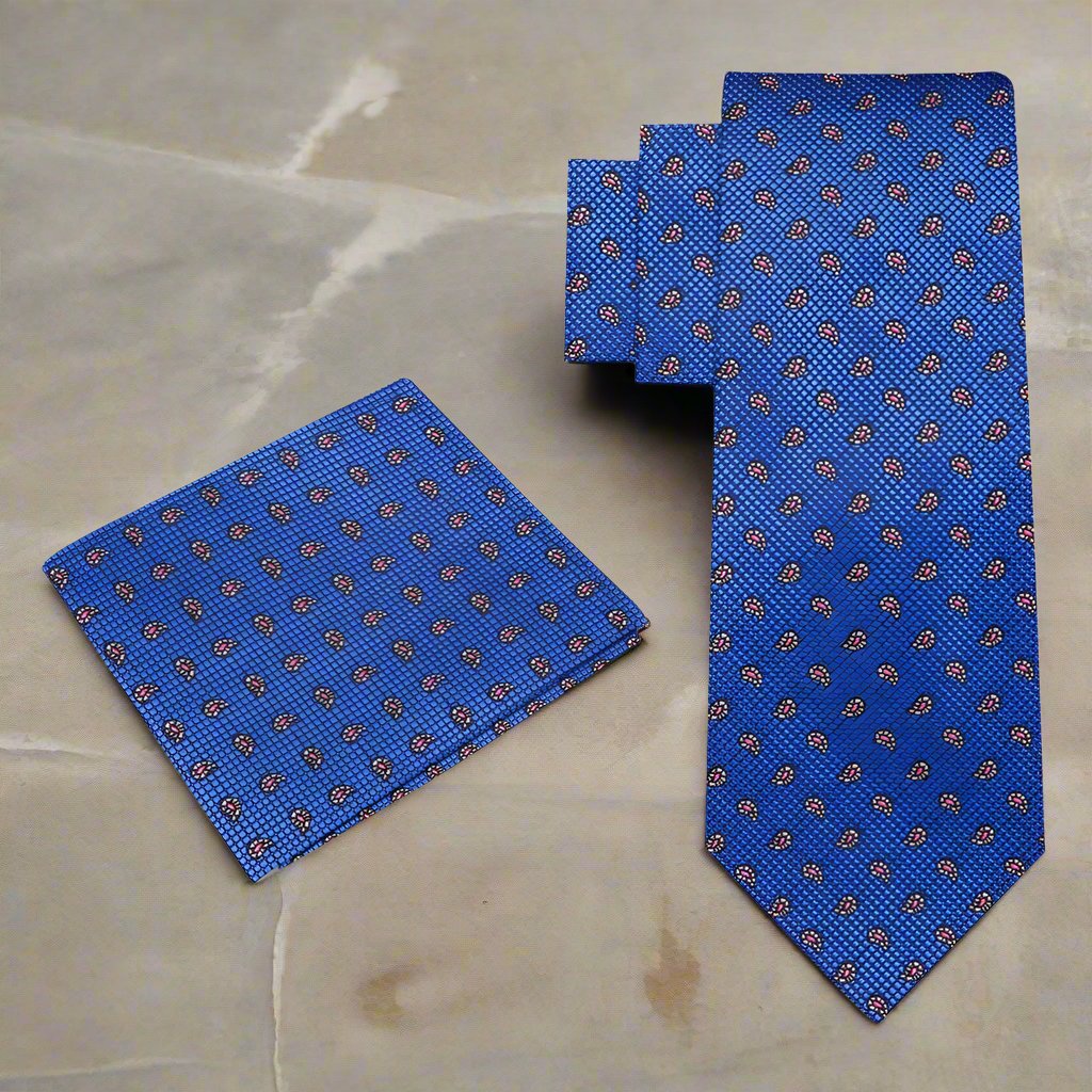 Model wearing yellow paisley silk necktie with navy suit for a wedding
