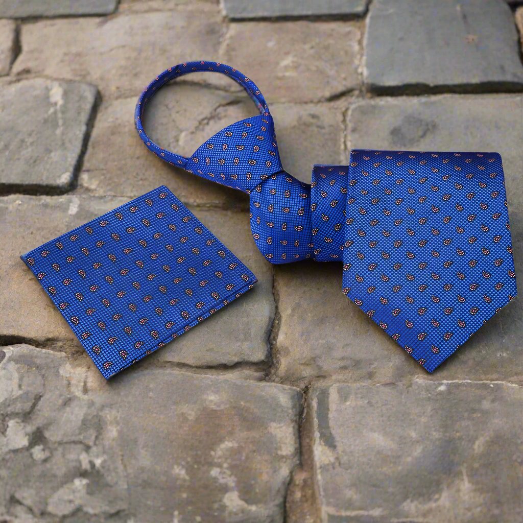 Vertical shot of yellow paisley silk tie on a dress shirt for formal occasion