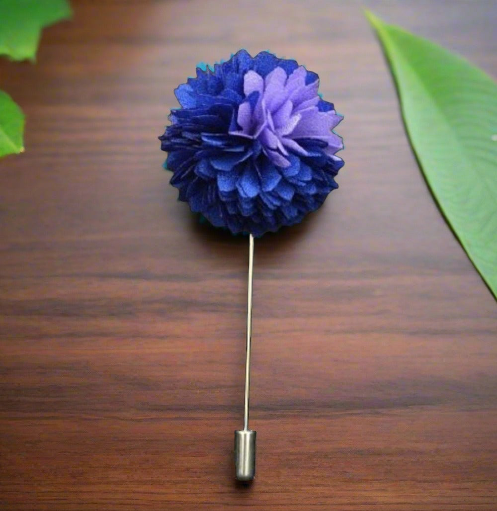 Elegant flower lapel pin on a tailored suit jacket, highlighting its stylish appeal.