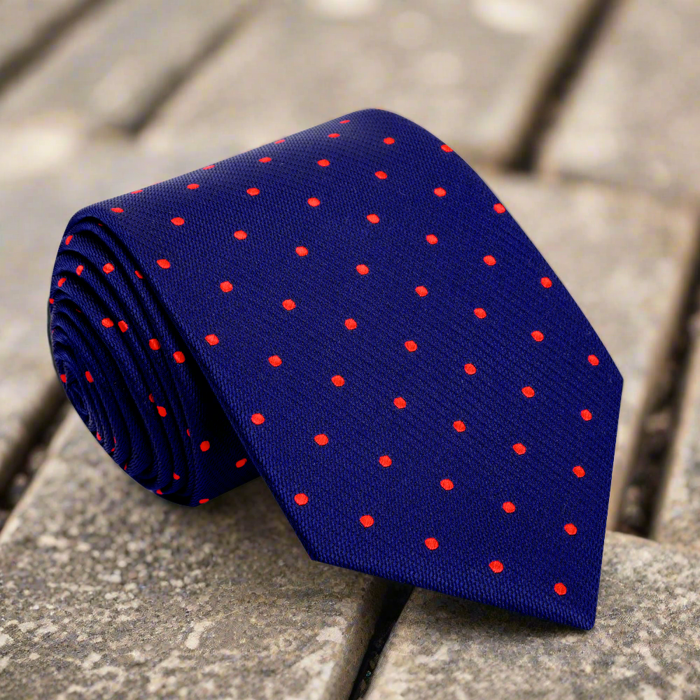Close-up of green polka dot tie, showcasing its vibrant dots and silk texture.