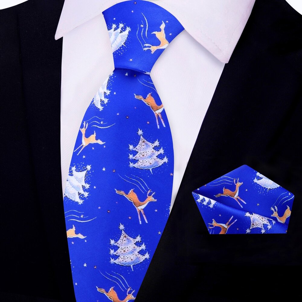 Man wearing a reindeer tie with a holiday suit for office Christmas party