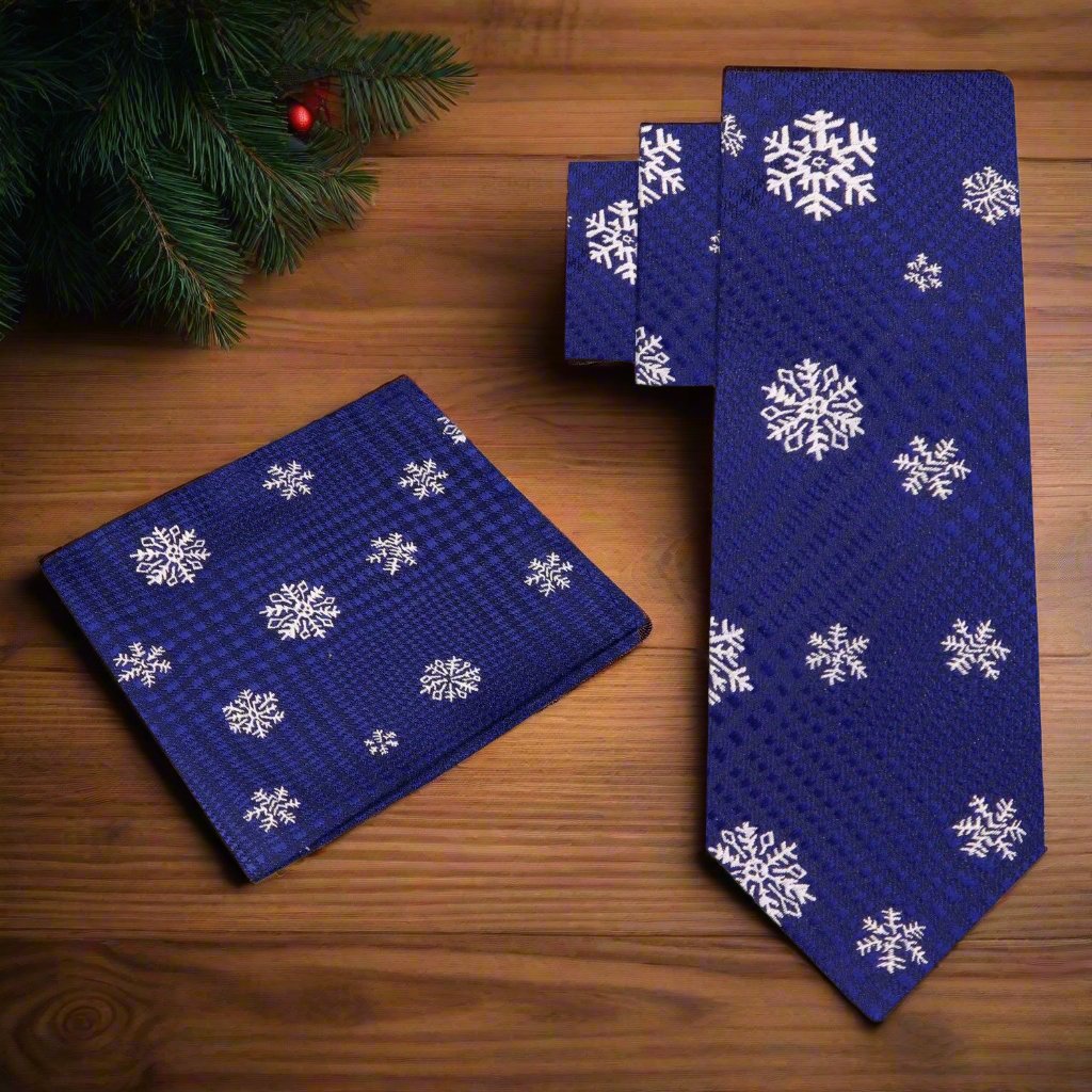 Winter-themed necktie paired with a matching pocket square, styled elegantly.