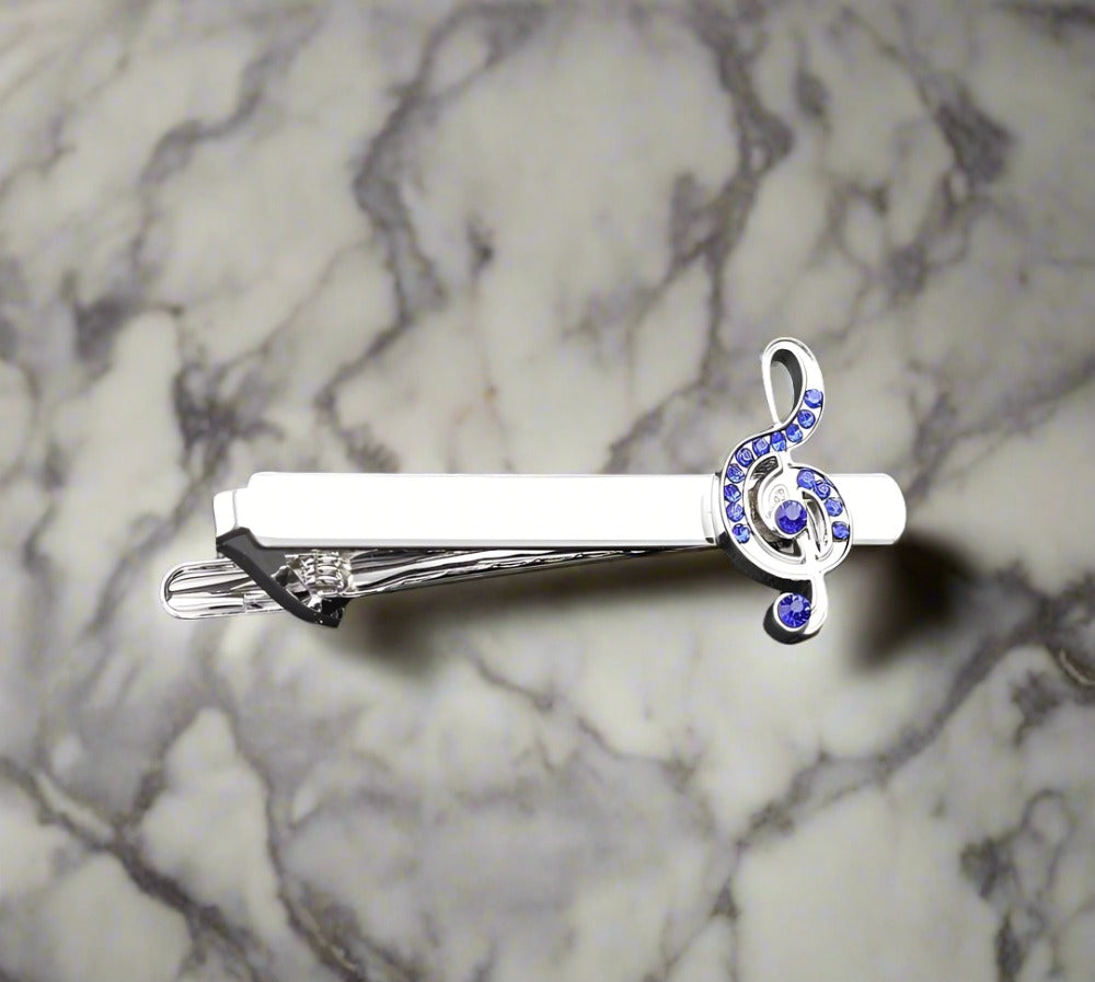 Men wearing high-quality mens jewelry with cufflinks and tie bar for business attire