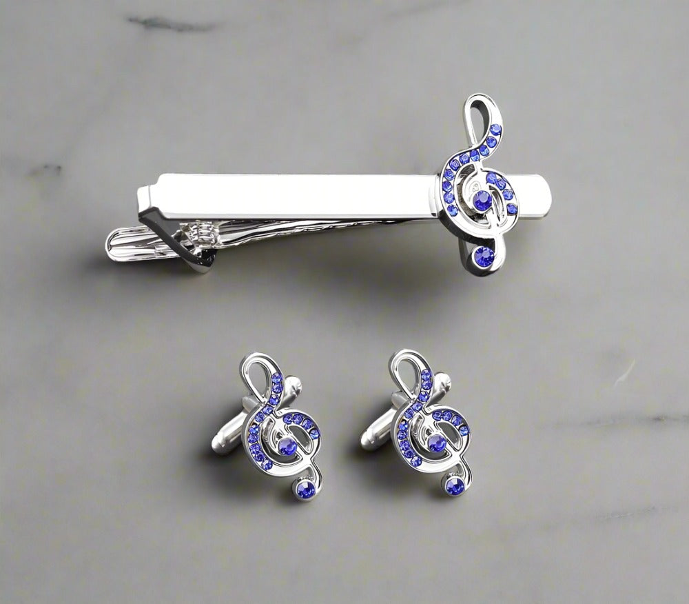 Money symbol cufflinks and tie bar set on a dress shirt for formal occasions