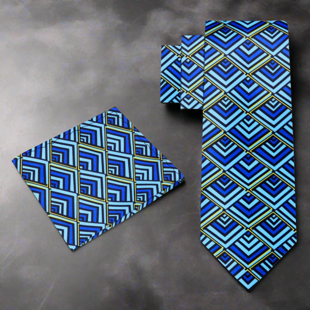 Nautilus geometric silk tie showcasing green and blue hues in a formal setting.