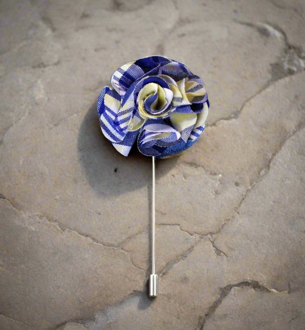 Styled tartan pin accessory for wedding attire
