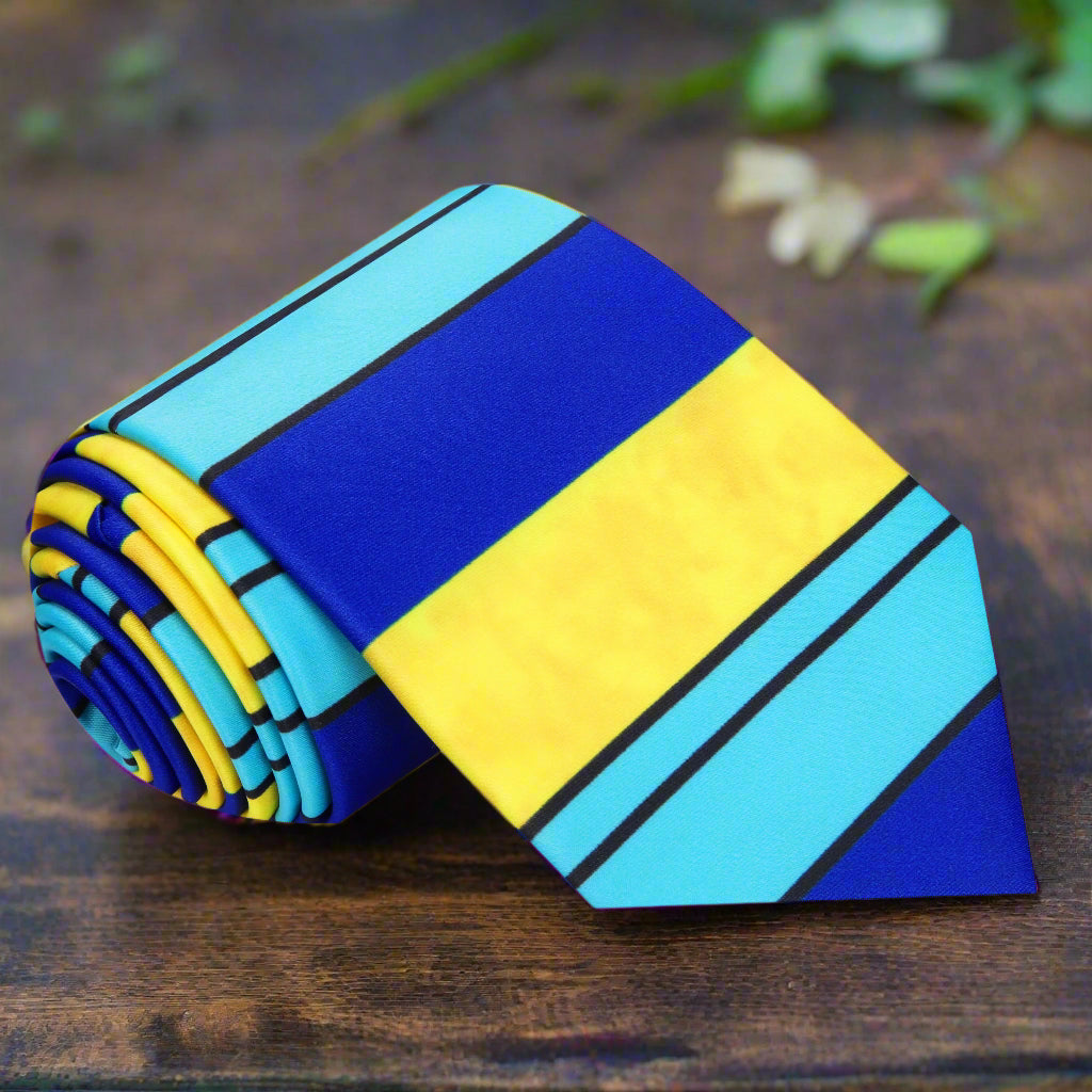 Elegant silk tie and pocket square set displayed on a wooden surface, showcasing the intricate stripe pattern.