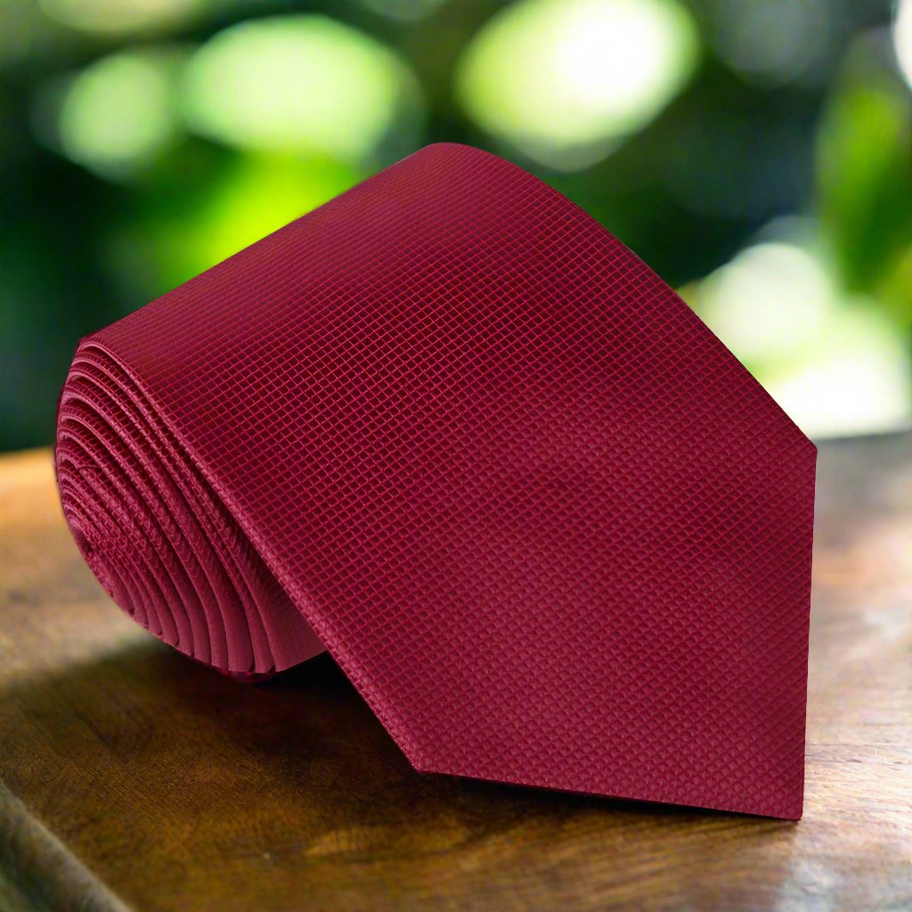 Matching pocket square in silk fabric for a coordinated formal look
