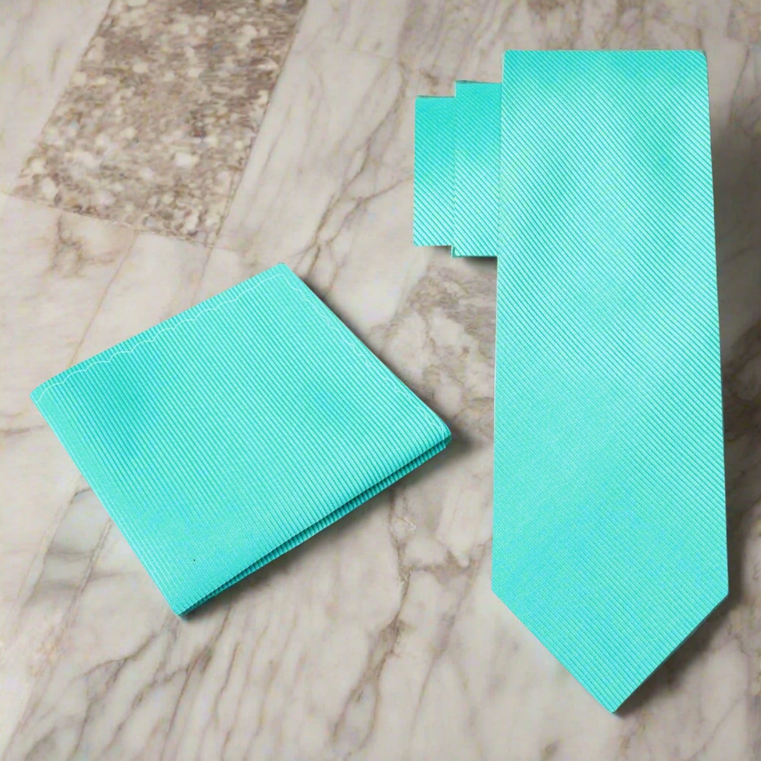 Bright red silk necktie paired with a white dress shirt for a sophisticated look.