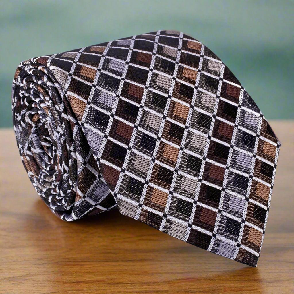 Elegant brown geometric silk tie displayed on a mannequin for formal events