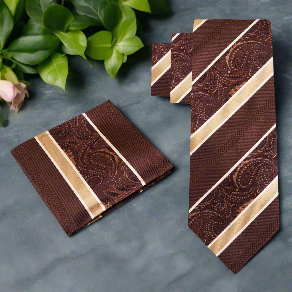 Close-up of the brown and gold silk tie showcasing paisley and stripe patterns
