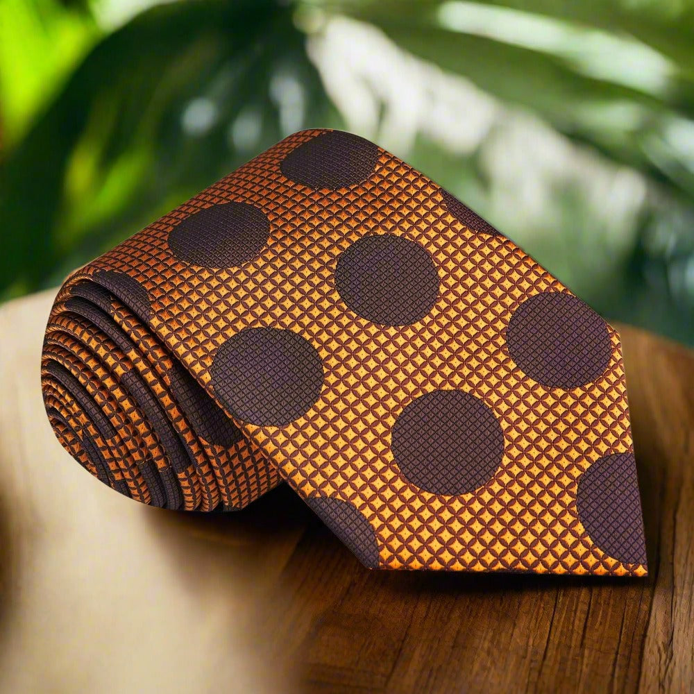 Large polka dot silk necktie in vibrant colors, showcasing the bold pattern against a white shirt.