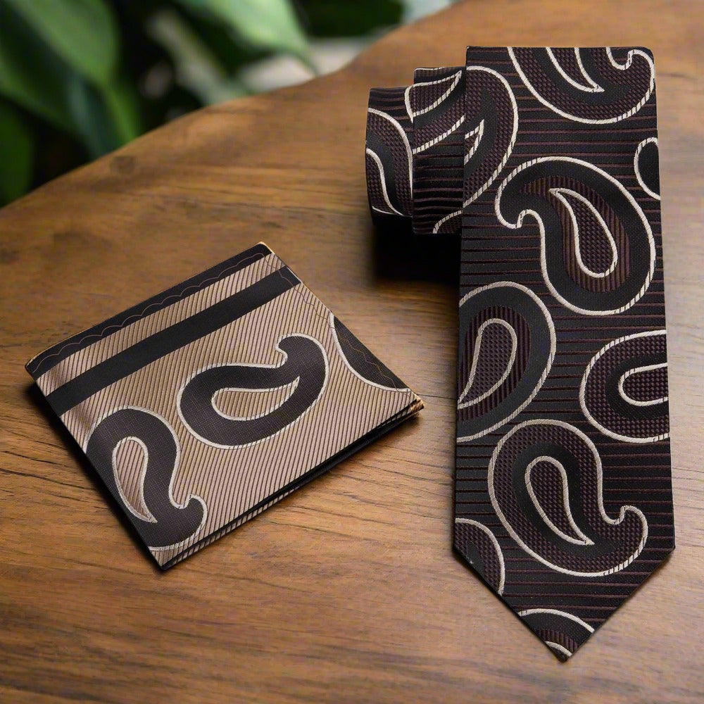 Close-up of a large paisley pattern silk necktie in dark red and black