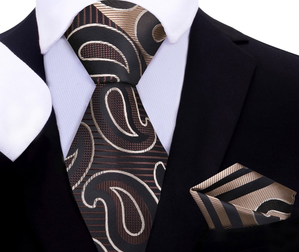 Silk paisley tie styled with a crisp white shirt and navy blazer