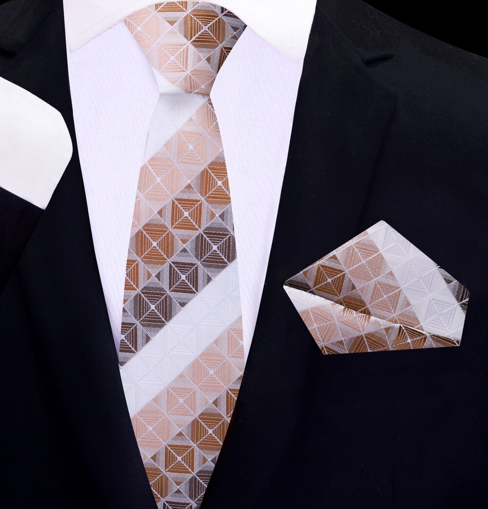 Close-up of a mens geometric silk tie in shades of brown and blue, showing detailed pattern and luxurious fabric.