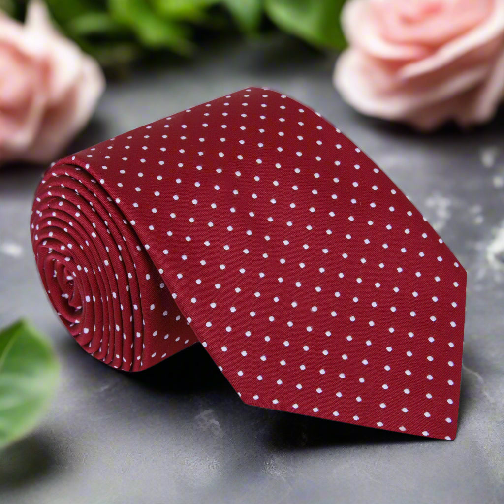 Timeless polka dot silk necktie in dark blue, showcasing its elegant design.