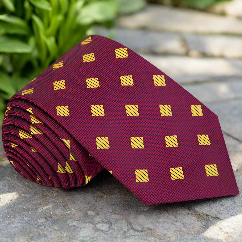 Close-up of geometric pink diamond pattern on a stylish mens tie